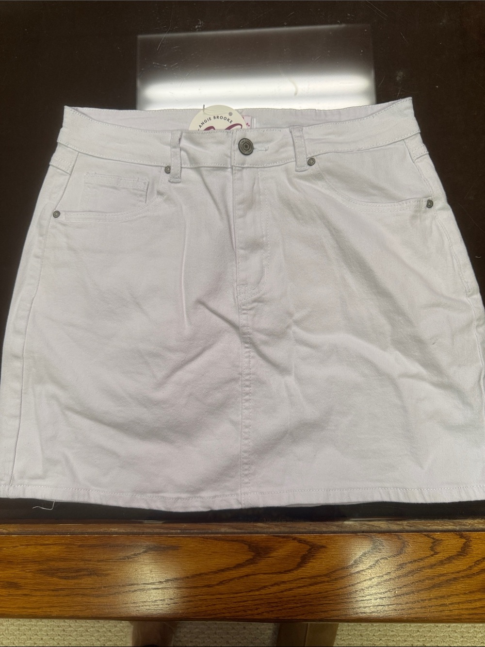 White Mini Denim Skirt with Front Pockets